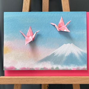 Handgefertigte Grußkarte Origami Kraniche Frühling Japan Chiyogami Yuzen zart Blüte rosa Papier für jemand Besonderen A6