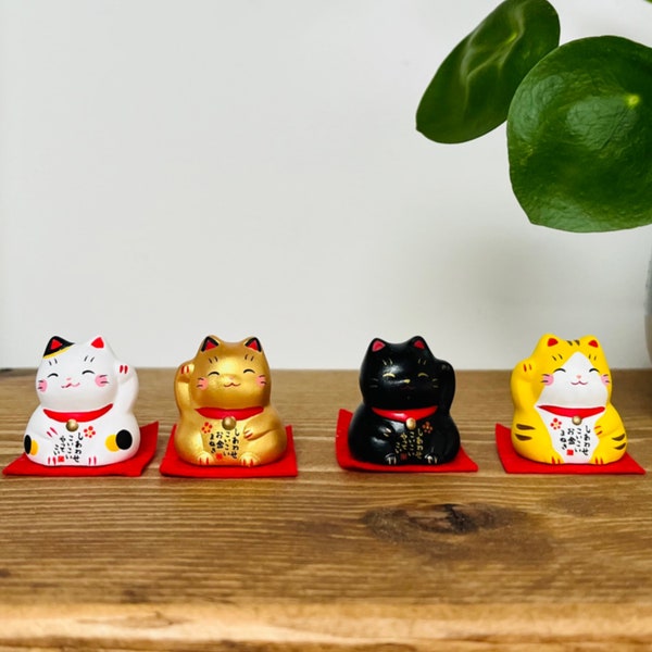 Cute  Miniature Japanese Maneki Neko lucky cats for good fortune. Kawaii