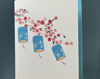 Greetings card Japanese Sakura blossoms and blue lanterns