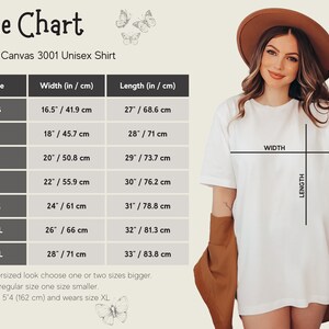 May include: Size chart for a Bella + Canvas 3001 unisex shirt, showing width and length measurements in inches and centimeters for sizes XS to 3XL. The chart includes a model wearing the shirt, illustrating the fit.