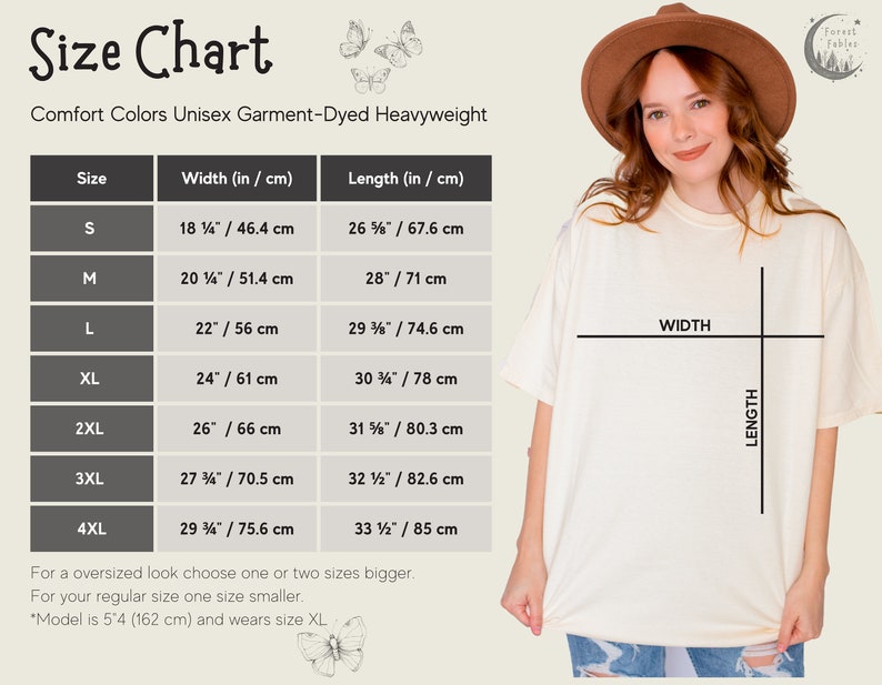 May include: Size chart for a unisex garment-dyed heavyweight t-shirt. The chart shows the width and length measurements in inches and centimeters for sizes S through 4XL. The chart also includes a note that for an oversized look, choose one or two sizes bigger, and for a regular size, choose one size smaller. The model is 5'4" (162 cm) and wears size XL.