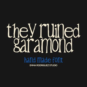 May include: Black background with the words "they ruined garamond" in a cream-colored, handwritten font. Below, in blue, it reads "hand made font" and "EMMA RODRIGUEZ STUDIO".
