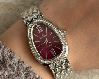Montre bulgare avec cadran bordeaux argenté et montre en pierre