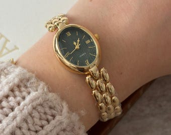 Montre vintage élégante et élégante à cadran vert ovale