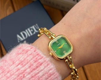 Montre pour femme Tiffany dorée à cadran vert