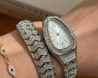 Montre serpent de luxe en pierre argentée