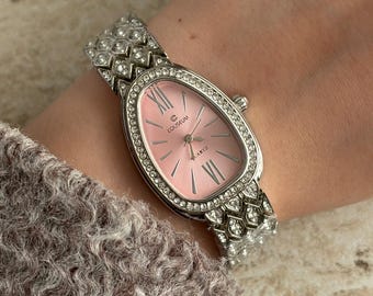 Montre bulgare avec cadran rose argenté et montre en pierre
