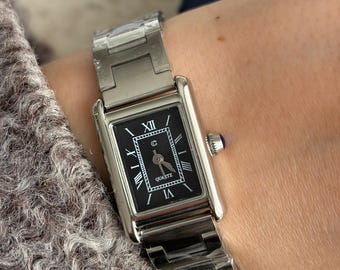 Montre modèle Merci avec cadran noir