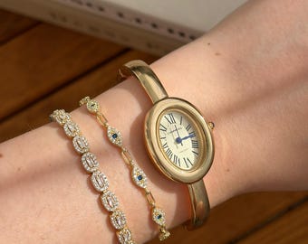 Montre couleur or BAIGNOIRE