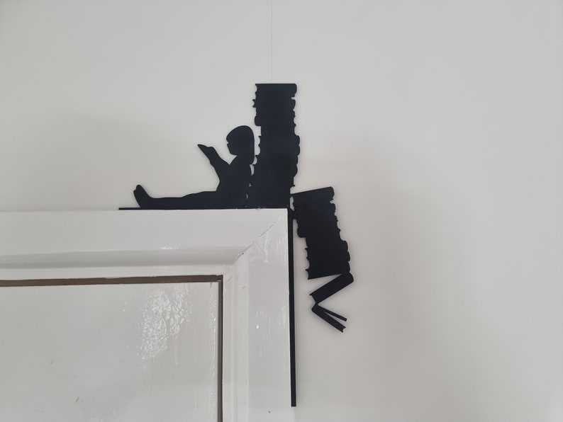 Girl sitting and reading books door decoration