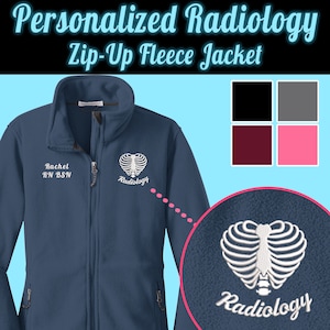 May include: A navy blue zip-up fleece jacket with a white embroidered heart containing a ribcage and the word "Radiology". The jacket also has the text "Rachel RN BSN" embroidered on the left side of the chest.
