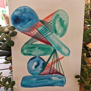 Puede incluir: Pintura abstracta en acuarela sobre papel blanco. La obra presenta formas azules y turquesas superpuestas con acentos de hilo rojo y verde. La composición es una mezcla única de acuarela y bordado.