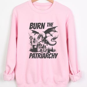 Burn The Patriarchy. Resistance vibes. for feminists and for those Who supports women's rights. Long sleeve crewneck pullover sweatshirt for women. very soft and comfortable choice. statement piece for everyday wear.