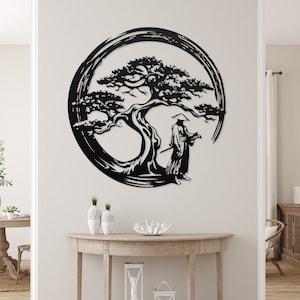 May include: Black metal wall art depicting a stylized Japanese bonsai tree with a figure standing beneath it, all within a circle.