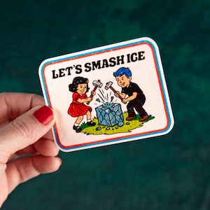 May include: A rectangular sticker with a retro illustration of two children smashing a block of ice with hammers. The sticker has a white border with blue and red accents and the text "LET'S SMASH ICE".