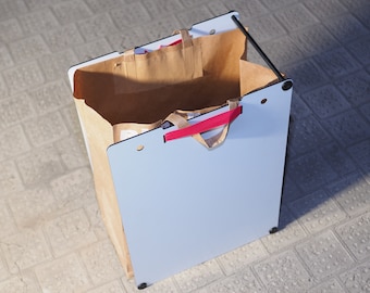 Eco friendly paper bag holder. Durable design, multiple sizes, waste, recycling, sustainable.