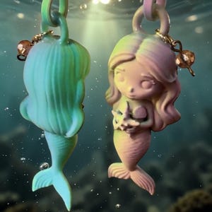 Ciondolo/tirante per cerniera a forma di sirena