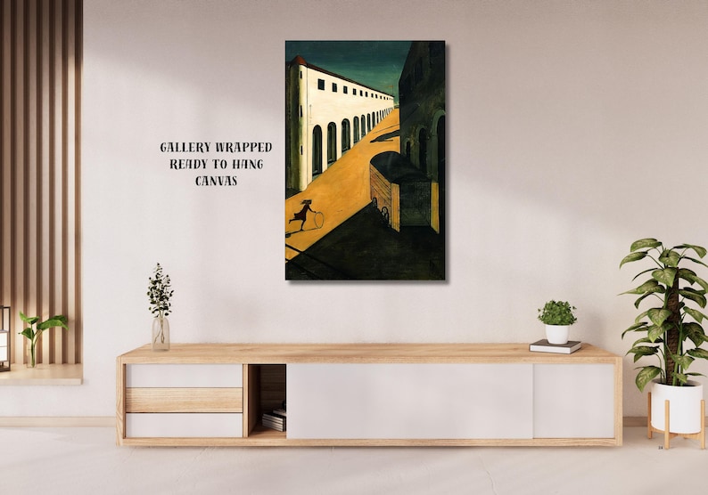 May include: A canvas print of an architectural scene with a figure rolling a hoop. The artwork features a long white building with arched windows and a yellow road. The text "GALLERY WRAPPED READY TO HANG CANVAS" is visible.
