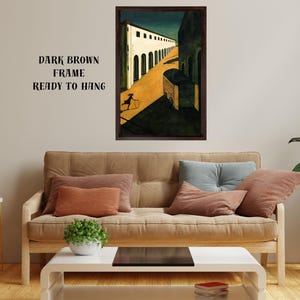 May include: A framed art print featuring a stylized street scene with a figure and a cart. The artwork is in a dark brown frame and ready to hang. The color palette includes yellow, green, and white.