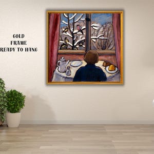 May include: A framed painting depicts a person gazing out a window at a snowy landscape with birds. A table is set with a teapot, plate, and food. The painting is in a gold frame. Text on the frame reads: GOLD FRAME READY TO HANG.