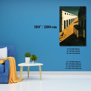 May include: A framed art print depicting an architectural scene with a figure. The artwork is displayed on a blue wall, with a sofa and side table in the foreground. The print is available in various sizes, including 16x20 inches (40x50cm).