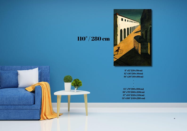 May include: A framed art print depicting an architectural scene with a figure. The artwork is displayed on a blue wall, with a sofa and side table in the foreground. The print is available in various sizes, including 16x20 inches (40x50cm).