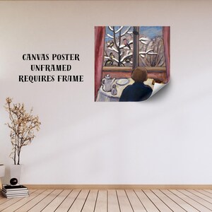May include: A canvas poster print depicting a person looking out a window at a snowy landscape. The scene includes a table with a teapot and plate. The text "CANVAS POSTER UNFRAMED REQUIRES FRAME" is printed on the wall.