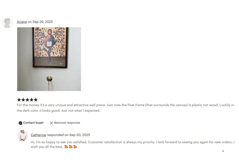 The image is a screenshot of a customer review for a wall art piece. The review is written in a text format and includes a rating of 5 stars, a contact information for the buyer, and a response from the seller.