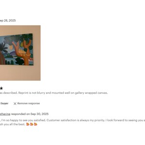 The image is a screenshot of a customer review for a painting. The review is 5 stars and expresses satisfaction with the artwork, stating that it looks as described and is not blurry. The review also mentions that the artist, Catherine, has a response on Sep 30, 2015. The review concludes with a wish for the artist to see the customer again for new orders and a friendly message expressing happiness to see the customer satisfied.