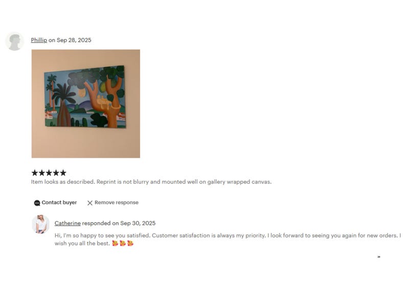The image is a screenshot of a customer review for a painting. The review is 5 stars and expresses satisfaction with the artwork, stating that it looks as described and is not blurry. The review also mentions that the artist, Catherine, has a response on Sep 30, 2015. The review concludes with a wish for the artist to see the customer again for new orders and a friendly message expressing happiness to see the customer satisfied.