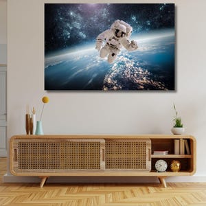 Astronaut in Space Canvas Art, Floating Spaceman Print