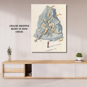 Op de afbeelding: Een canvas print van een surrealistisch kunstwerk. De afbeelding toont een gefragmenteerde stenen structuur met losse ledematen en een klein figuur. De tekst "GALLERY WRAPPED READY TO HANG CANVAS" is zichtbaar.