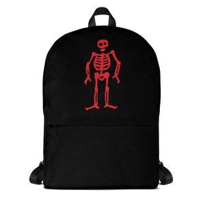 May include: Black backpack with a red skeleton graphic on the front. The skeleton is standing with its arms outstretched.
