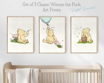May include: Set of three Winnie the Pooh nursery art prints. The prints feature Winnie the Pooh and Piglet in various scenes. The prints are in a white frame and are ready to be hung on the wall.