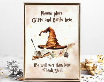 May include: A sign with a brown witch hat and stars on a beige background. The sign says "Please place Gifts and Cards here. We will sort them later. Thank You!"