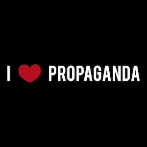 May include: A black graphic design featuring the white text I, a red heart symbol, and the white text PROPAGANDA. The layout is centered with bold, sans-serif lettering and a solid red heart icon positioned between the letter I and the word.