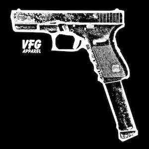 May include: A high-contrast white graphic print on a black background featuring a semi-automatic pistol with an extended magazine. The design includes the text VFG APPAREL positioned to the left of the firearm, rendered in a bold, stylized font.