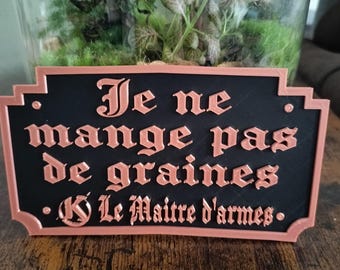 Kaamelott plaque – quote from the Master-at-Arms: “I don’t eat seeds”