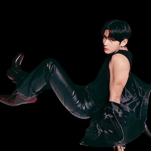 May include: A person wearing a black sleeveless top, black leather pants, and black leather jacket, with red-soled boots. The person is posed against a black background, with a focused gaze.