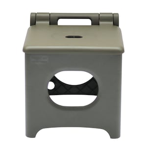 May include: A gray plastic folding step stool with a handle on top. The stool has a cutout in the front and a small hole on the top.