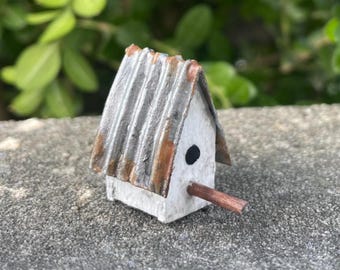 Handmade miniature birdhouse for dollhouse or indoor fairy garden.