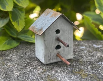 Handmade miniature birdhouse for dollhouse or indoor fairy garden.