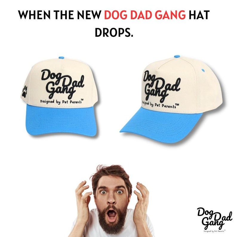 May include: Two baseball caps with the text "Dog Dad Gang" in black script, designed by Pet Parents. The caps have a cream-colored crown and a light blue brim. The image also includes the text "WHEN THE NEW DOG DAD GANG HAT DROPS."