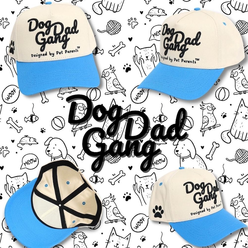 May include: A collection of baseball caps with the text "Dog Dad Gang" in black script. The caps have a cream-colored crown and a light blue brim. The background features a repeating pattern of dog and cat-themed doodles.