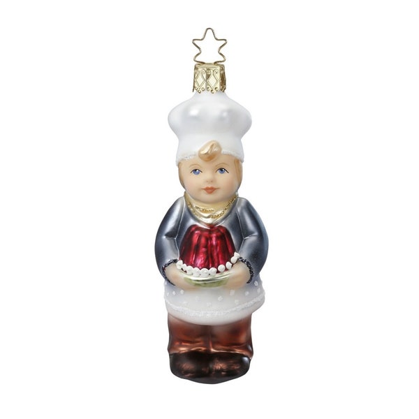 Collectible hand-blown and hand-painted glass tree ornament Baking a cake. Made in the traditional method by the best European craftsmen.