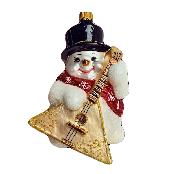 Collectible hand-blown and hand-painted glass tree ornament Snowman. Made in the traditional method by the best European craftsmen.