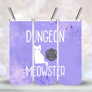 May include: A purple and white watercolor tumbler with a white cat and a 20-sided die. The text "Dungeon Meowster" is printed on the tumbler.