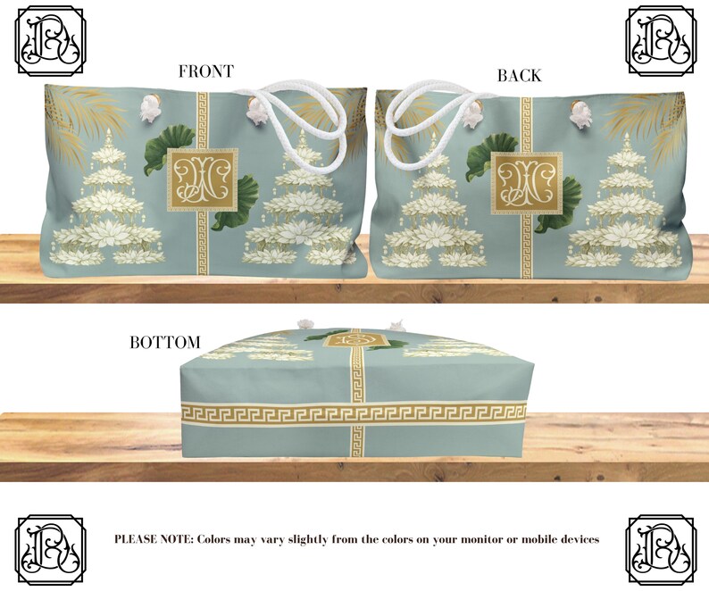May include: A light blue tote bag with white rope handles, featuring a repeating pattern of white floral designs and gold accents. The bag has a rectangular shape with a Greek key border design.