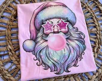 レトロなバブルガムサンタのピンクの快適な色、クリスマスガーリーサンタ、女の子向けのかわいいサンタシャツ、ママサンタシャツ、ピンクのサンタバブルガムシャツ