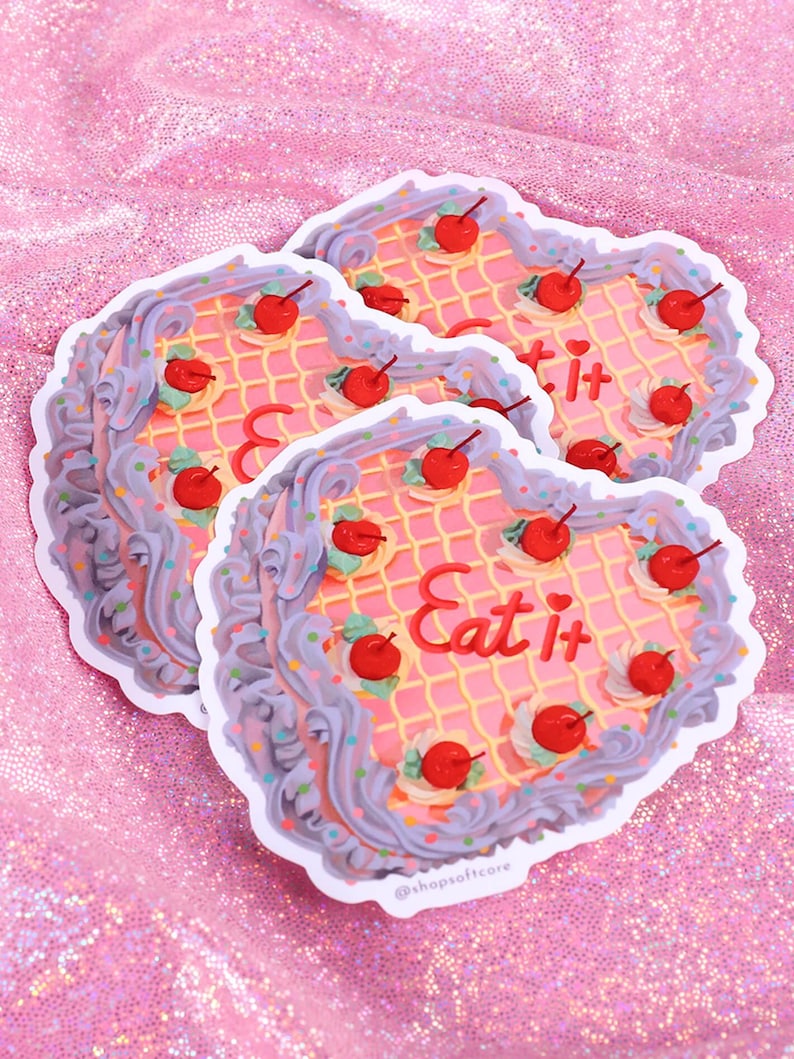 Vintage style cake that says eat it sticker.